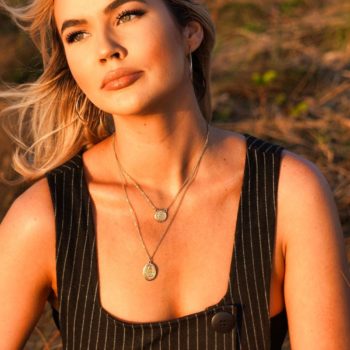 woman wearing black and gray pinstripe tank dress